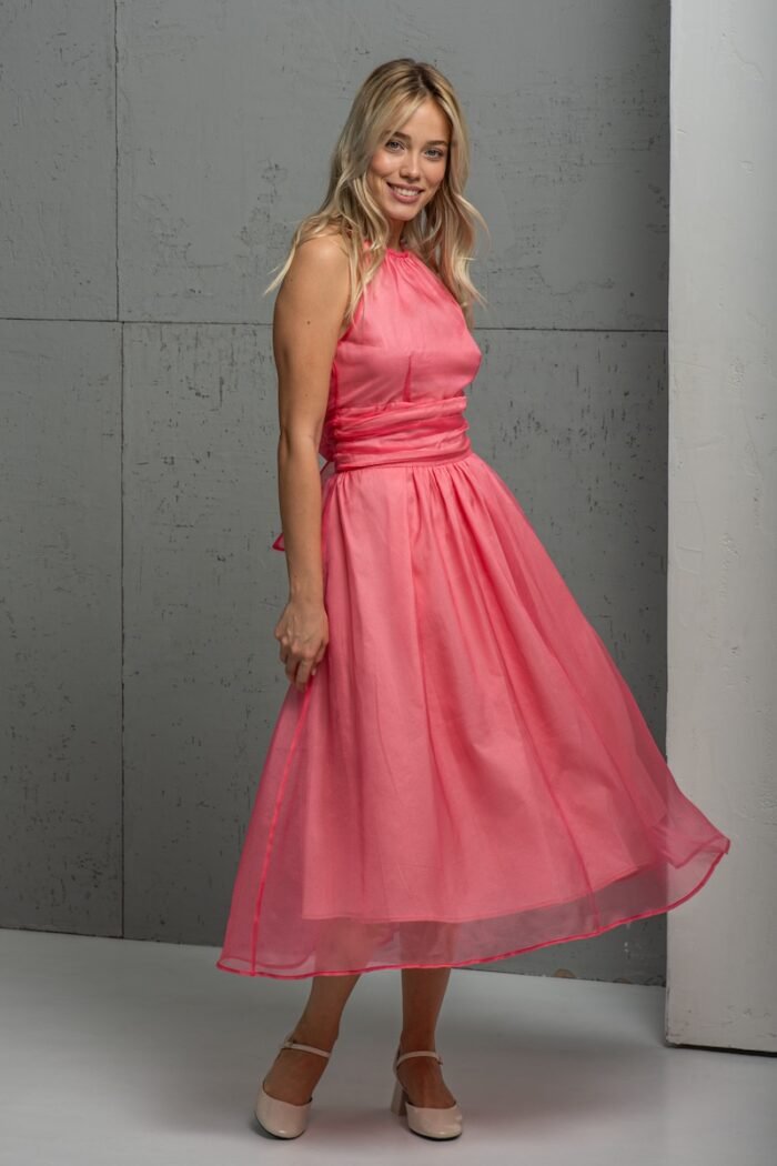 The blonde girl wears a pink BARBARA silk organdy skirt.