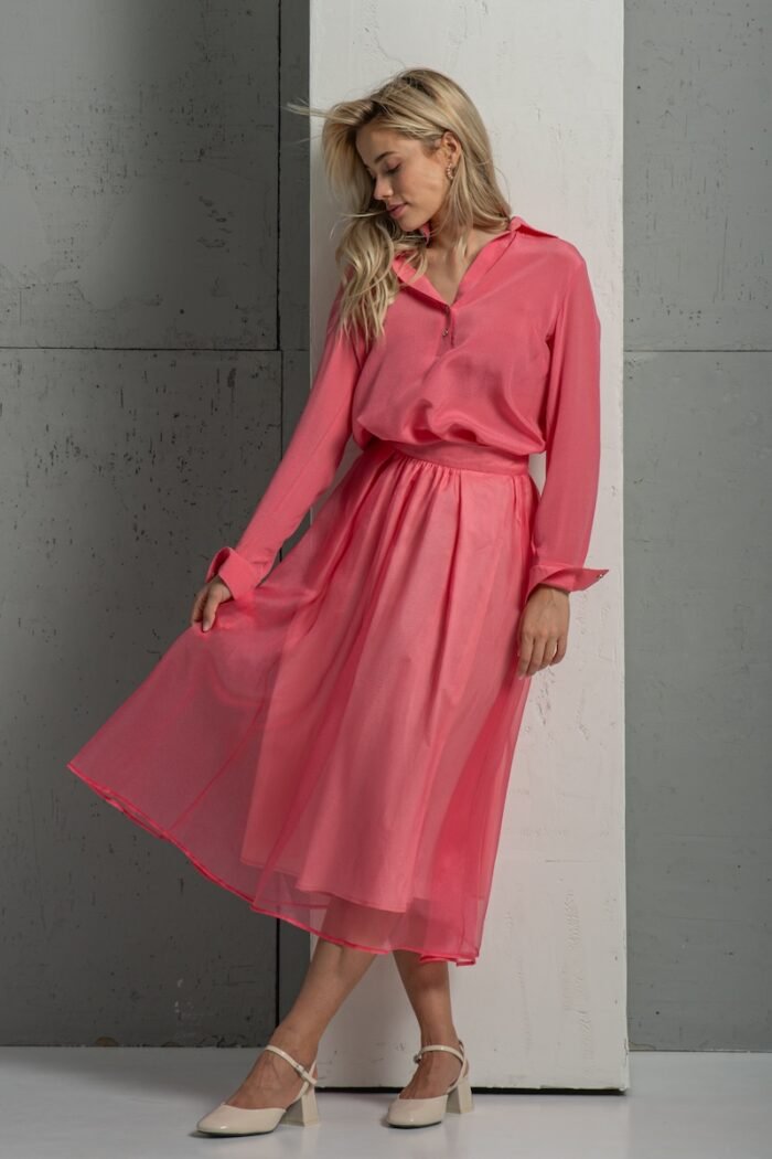 The blonde girl wears a pink BARBARA silk organdy skirt.