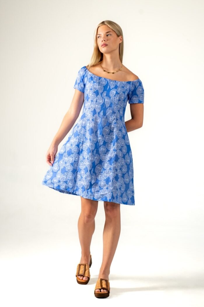 The girl is wearing a short blue and white dress with short sleeves.