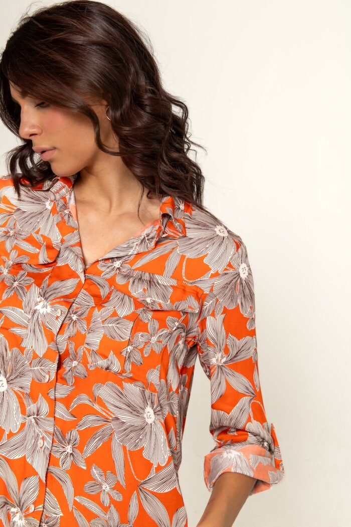 Orange viscose midi shirt-dress with an exotic floral print.