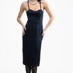 The girl is wearing a black satin strappy midi dress.