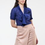 BIBA suknja u boji u kajsije, slikana spreda.