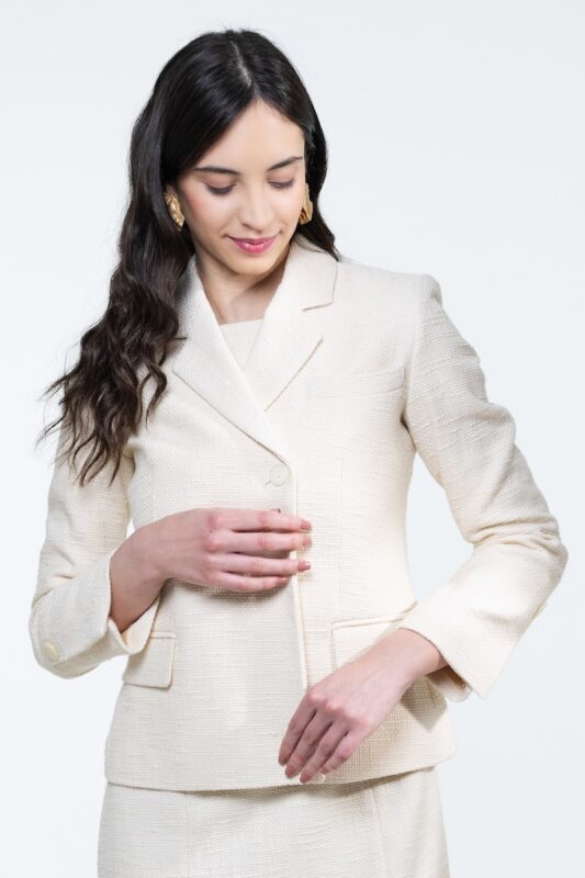 GIGI fitted blazer made of ecru cotton bouclé, photographed from the front