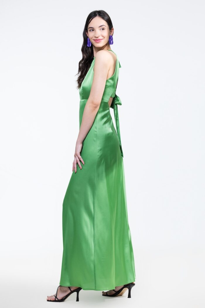 HELENA dress in green satin, photographed from the front.