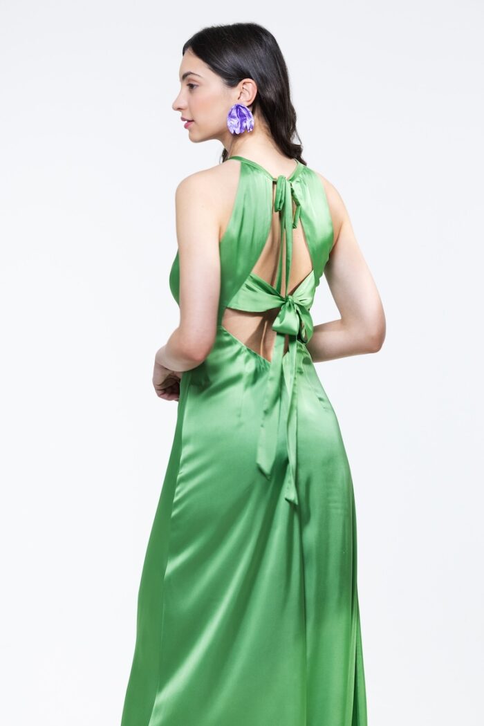 HELENA dress in green satin, photographed from the front.