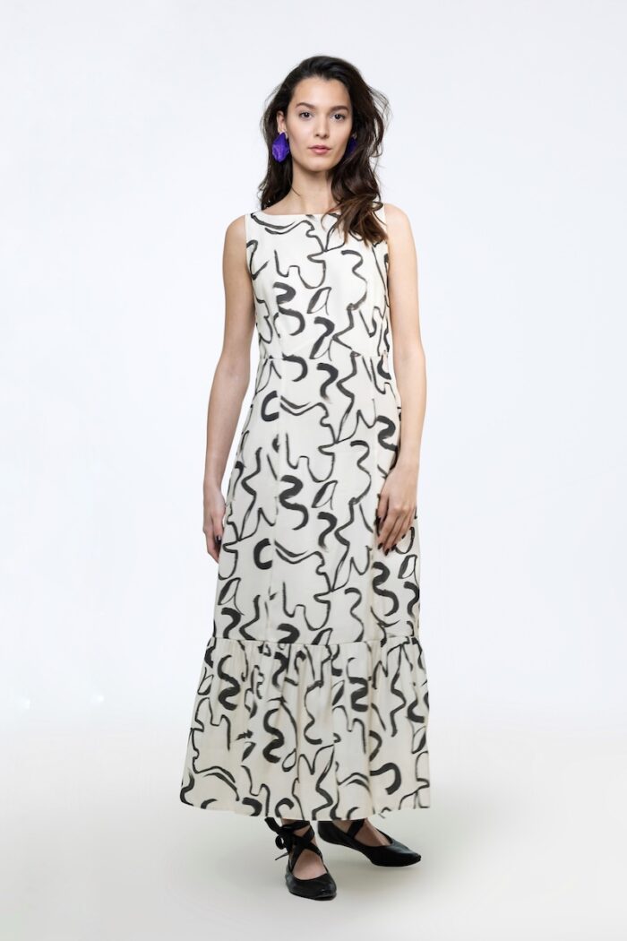 IVORY dress in ecru and black print, photographed from the front.