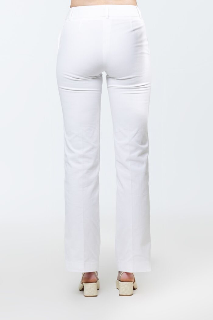 REBECCA white pants, photographed from the back.