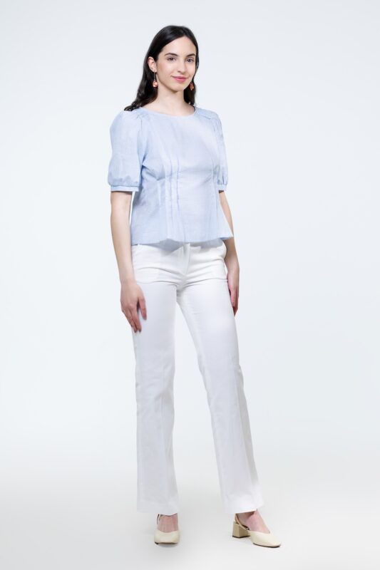 REBECCA white pants, photographed from the front.