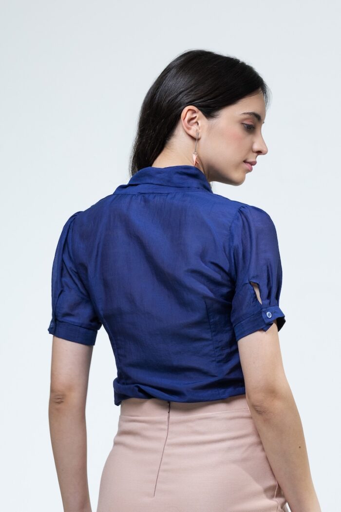 TARA blouse in blue, photographed from the back.