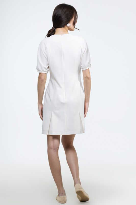 ZOJA haljina krem bele boje, slikana otpozadi.